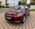 Красный Мазда СХ-7, объемом двигателя 2.5 л и пробегом 218 тыс. км за 7500 $, фото 1 на Automoto.ua