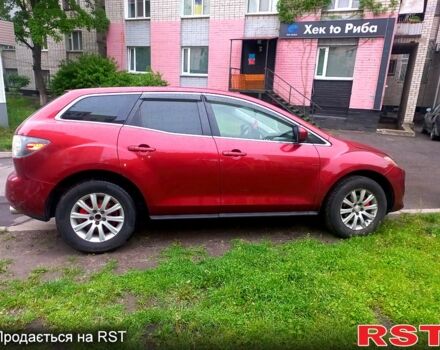 Красный Мазда СХ-7, объемом двигателя 2.5 л и пробегом 230 тыс. км за 12000 $, фото 3 на Automoto.ua