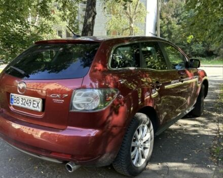 Красный Мазда СХ-7, объемом двигателя 2.5 л и пробегом 200 тыс. км за 10447 $, фото 1 на Automoto.ua