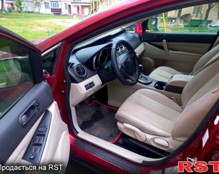 Красный Мазда СХ-7, объемом двигателя 2.5 л и пробегом 230 тыс. км за 12000 $, фото 5 на Automoto.ua