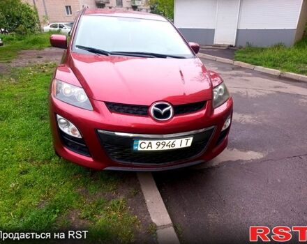 Красный Мазда СХ-7, объемом двигателя 2.5 л и пробегом 230 тыс. км за 12000 $, фото 1 на Automoto.ua