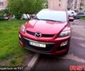 Красный Мазда СХ-7, объемом двигателя 2.5 л и пробегом 230 тыс. км за 12000 $, фото 1 на Automoto.ua