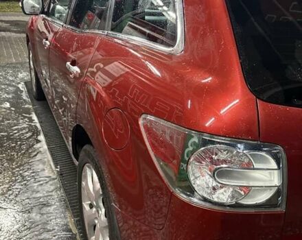 Красный Мазда СХ-7, объемом двигателя 2.18 л и пробегом 230 тыс. км за 9350 $, фото 3 на Automoto.ua