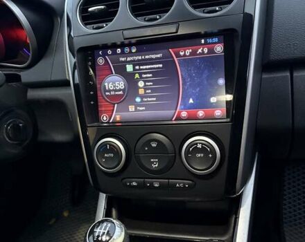 Красный Мазда СХ-7, объемом двигателя 2.18 л и пробегом 230 тыс. км за 9350 $, фото 16 на Automoto.ua