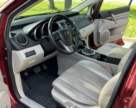 Красный Мазда СХ-7, объемом двигателя 2.5 л и пробегом 200 тыс. км за 10496 $, фото 2 на Automoto.ua