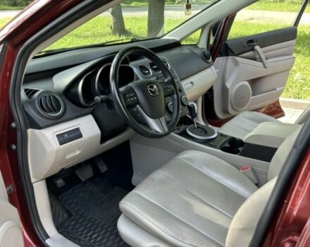 Красный Мазда СХ-7, объемом двигателя 2.5 л и пробегом 200 тыс. км за 10447 $, фото 2 на Automoto.ua