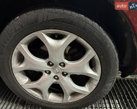 Красный Мазда СХ-7, объемом двигателя 2.18 л и пробегом 230 тыс. км за 9350 $, фото 7 на Automoto.ua