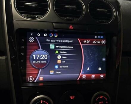 Красный Мазда СХ-7, объемом двигателя 2.18 л и пробегом 230 тыс. км за 9350 $, фото 12 на Automoto.ua