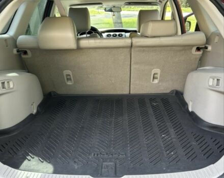 Красный Мазда СХ-7, объемом двигателя 2.5 л и пробегом 200 тыс. км за 10447 $, фото 9 на Automoto.ua