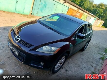 Красный Мазда СХ-7, объемом двигателя 2.3 л и пробегом 138 тыс. км за 6500 $, фото 1 на Automoto.ua