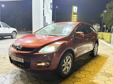 Червоний Мазда СХ-7, об'ємом двигуна 2.3 л та пробігом 140 тис. км за 5950 $, фото 1 на Automoto.ua