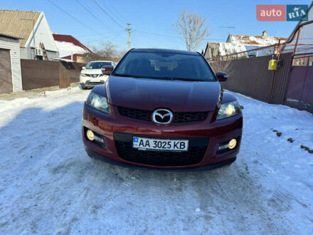 Красный Мазда СХ-7, объемом двигателя 2.3 л и пробегом 170 тыс. км за 6800 $, фото 1 на Automoto.ua
