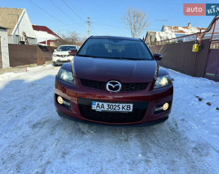 Красный Мазда СХ-7, объемом двигателя 2.3 л и пробегом 170 тыс. км за 6800 $, фото 1 на Automoto.ua