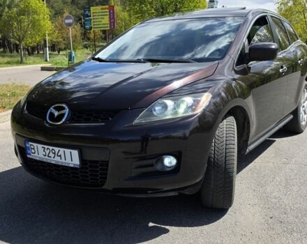 Красный Мазда СХ-7, объемом двигателя 2.3 л и пробегом 170 тыс. км за 6300 $, фото 1 на Automoto.ua