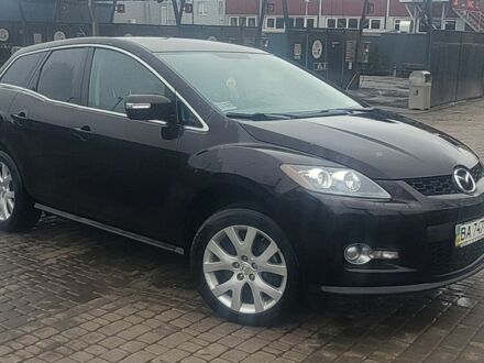 Красный Мазда СХ-7, объемом двигателя 2.3 л и пробегом 212 тыс. км за 5700 $, фото 1 на Automoto.ua