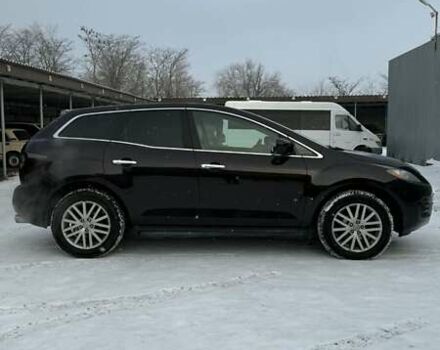 Красный Мазда СХ-7, объемом двигателя 2.26 л и пробегом 110 тыс. км за 7500 $, фото 1 на Automoto.ua