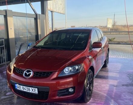 Красный Мазда СХ-7, объемом двигателя 2.3 л и пробегом 255 тыс. км за 6600 $, фото 1 на Automoto.ua