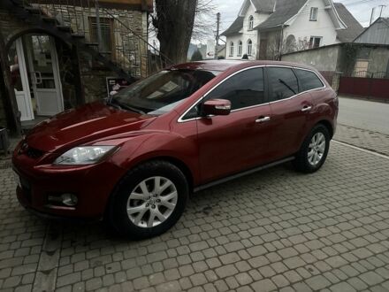 Красный Мазда СХ-7, объемом двигателя 2.3 л и пробегом 210 тыс. км за 5500 $, фото 1 на Automoto.ua