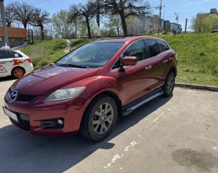 Красный Мазда СХ-7, объемом двигателя 2.3 л и пробегом 192 тыс. км за 6800 $, фото 1 на Automoto.ua