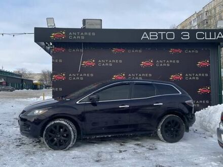 Красный Мазда СХ-7, объемом двигателя 2.3 л и пробегом 174 тыс. км за 6500 $, фото 1 на Automoto.ua