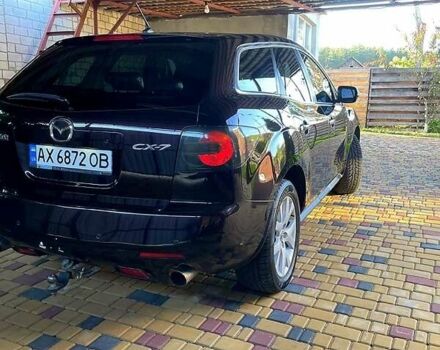 Красный Мазда СХ-7, объемом двигателя 2.3 л и пробегом 164 тыс. км за 5850 $, фото 1 на Automoto.ua