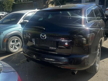 Красный Мазда СХ-7, объемом двигателя 2.3 л и пробегом 230 тыс. км за 7300 $, фото 1 на Automoto.ua