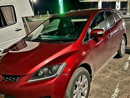 Красный Мазда СХ-7, объемом двигателя 2.3 л и пробегом 240 тыс. км за 7500 $, фото 1 на Automoto.ua