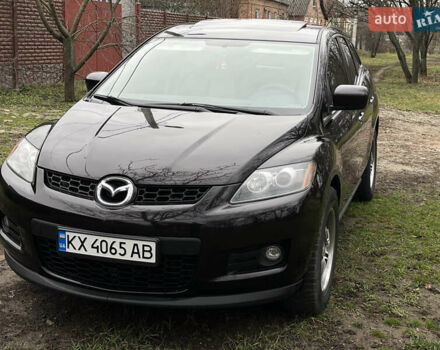 Красный Мазда СХ-7, объемом двигателя 2.3 л и пробегом 113 тыс. км за 7500 $, фото 1 на Automoto.ua