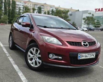Красный Мазда СХ-7, объемом двигателя 2.26 л и пробегом 171 тыс. км за 7400 $, фото 1 на Automoto.ua