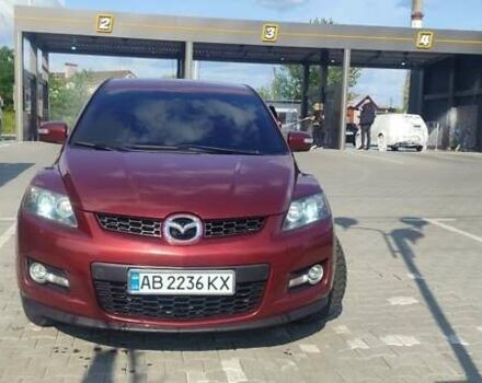 Красный Мазда СХ-7, объемом двигателя 2.3 л и пробегом 161 тыс. км за 7000 $, фото 1 на Automoto.ua