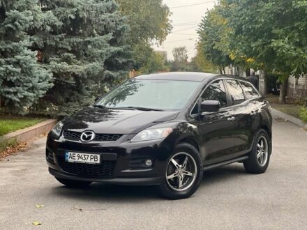 Красный Мазда СХ-7, объемом двигателя 2.3 л и пробегом 179 тыс. км за 7800 $, фото 1 на Automoto.ua