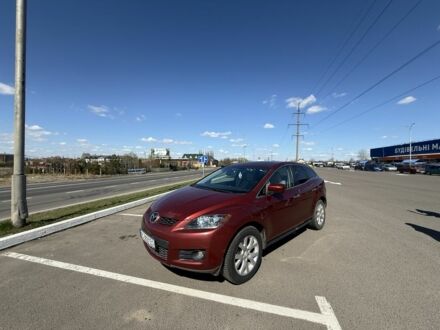 Красный Мазда СХ-7, объемом двигателя 2.3 л и пробегом 157 тыс. км за 7500 $, фото 1 на Automoto.ua