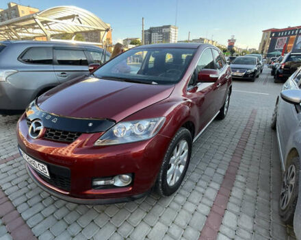 Красный Мазда СХ-7, объемом двигателя 2.26 л и пробегом 145 тыс. км за 8500 $, фото 1 на Automoto.ua