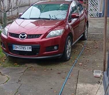 Красный Мазда СХ-7, объемом двигателя 2.3 л и пробегом 135 тыс. км за 7654 $, фото 1 на Automoto.ua