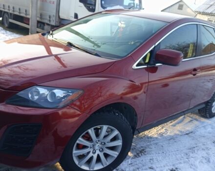 Красный Мазда СХ-7, объемом двигателя 2.5 л и пробегом 219 тыс. км за 7941 $, фото 1 на Automoto.ua