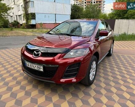 Красный Мазда СХ-7, объемом двигателя 2.5 л и пробегом 218 тыс. км за 7500 $, фото 1 на Automoto.ua