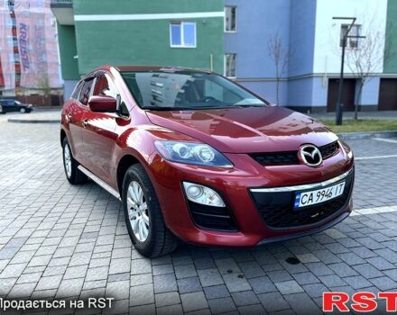 Красный Мазда СХ-7, объемом двигателя 2.5 л и пробегом 250 тыс. км за 10500 $, фото 1 на Automoto.ua