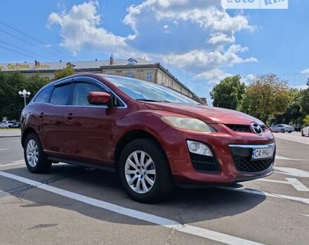 Красный Мазда СХ-7, объемом двигателя 2.5 л и пробегом 270 тыс. км за 9000 $, фото 1 на Automoto.ua