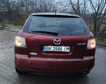 Красный Мазда СХ-7, объемом двигателя 2.5 л и пробегом 340 тыс. км за 9898 $, фото 1 на Automoto.ua