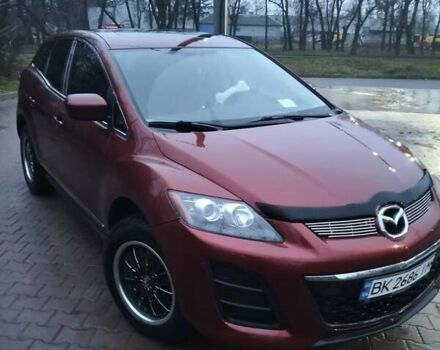 Красный Мазда СХ-7, объемом двигателя 2.5 л и пробегом 254 тыс. км за 8500 $, фото 1 на Automoto.ua