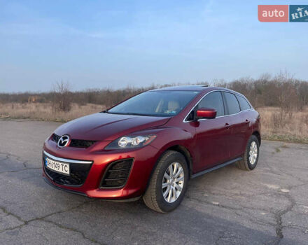Красный Мазда СХ-7, объемом двигателя 2.5 л и пробегом 195 тыс. км за 11000 $, фото 1 на Automoto.ua