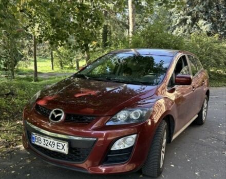 Красный Мазда СХ-7, объемом двигателя 2.5 л и пробегом 200 тыс. км за 10447 $, фото 1 на Automoto.ua