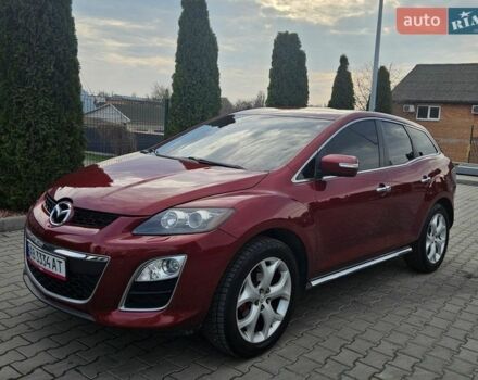 Красный Мазда СХ-7, объемом двигателя 2.3 л и пробегом 115 тыс. км за 11200 $, фото 1 на Automoto.ua