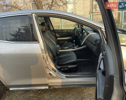 Мазда СХ-7, объемом двигателя 2.2 л и пробегом 198 тыс. км за 9600 $, фото 5 на Automoto.ua