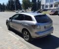 Серый Мазда СХ-7, объемом двигателя 2.2 л и пробегом 115 тыс. км за 10999 $, фото 4 на Automoto.ua