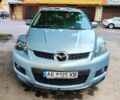 Серый Мазда СХ-7, объемом двигателя 2.26 л и пробегом 162 тыс. км за 6700 $, фото 1 на Automoto.ua