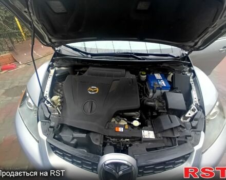 Серый Мазда СХ-7, объемом двигателя 2.3 л и пробегом 99 тыс. км за 6000 $, фото 1 на Automoto.ua