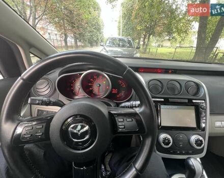 Серый Мазда СХ-7, объемом двигателя 2.3 л и пробегом 150 тыс. км за 7000 $, фото 1 на Automoto.ua
