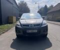 Серый Мазда СХ-7, объемом двигателя 2.3 л и пробегом 150 тыс. км за 7000 $, фото 3 на Automoto.ua