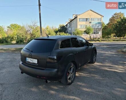 Серый Мазда СХ-7, объемом двигателя 2.3 л и пробегом 270 тыс. км за 6500 $, фото 4 на Automoto.ua